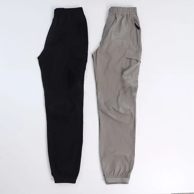 Pantalones de ropa para hombre, pantalones casuales, mallas para correr con múltiples bolsillos para hombre en primavera y veran