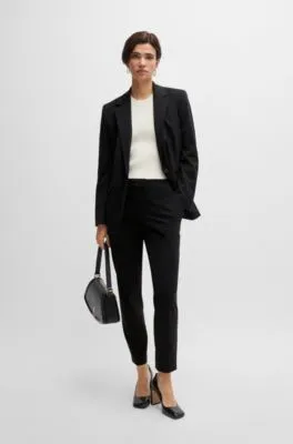 Pantalones slim fit de punto técnico elástico